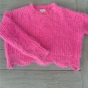 Pink fuzzy sweater with scalloped edges
